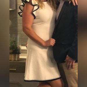 White dress with blue accent